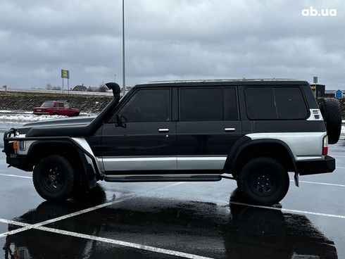 Nissan Patrol 1996 черный - фото 4