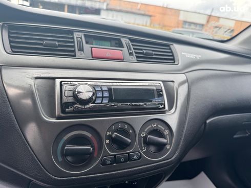 Mitsubishi Lancer 2008 черный - фото 17