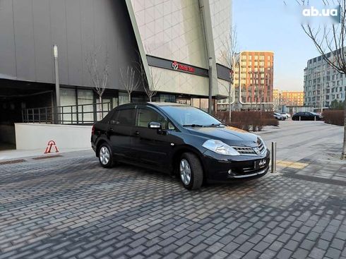 Nissan Tiida 2012 - фото 27