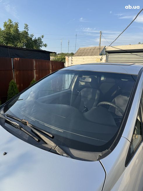 Mitsubishi Grandis 2005 серебристый - фото 2