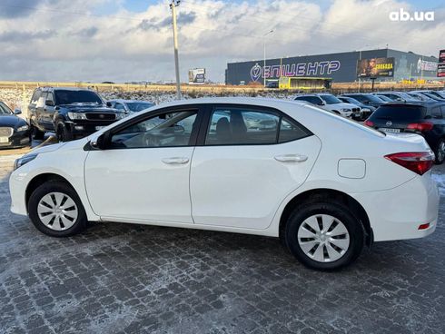 Toyota Corolla 2014 белый - фото 11