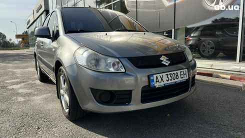 Suzuki SX4 2008 серый - фото 10