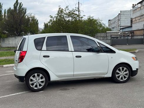 Mitsubishi Colt 2010 белый - фото 6