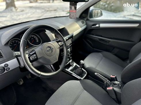 Opel Astra 2010 - фото 21