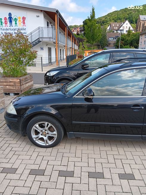 Volkswagen Passat 2004 черный - фото 19