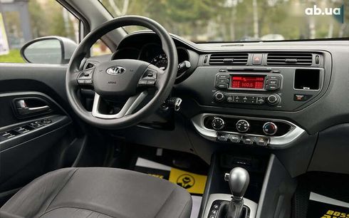 Kia Rio 2014 - фото 12