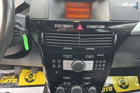 Opel Astra 2010 - фото 15