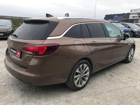 Opel Astra 2016 коричневый - фото 8