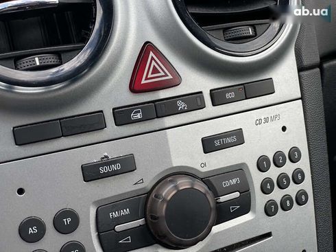 Opel Corsa 2011 - фото 15