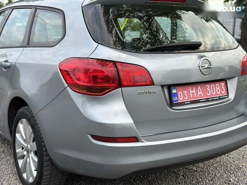 Opel Astra 2010 - фото 18