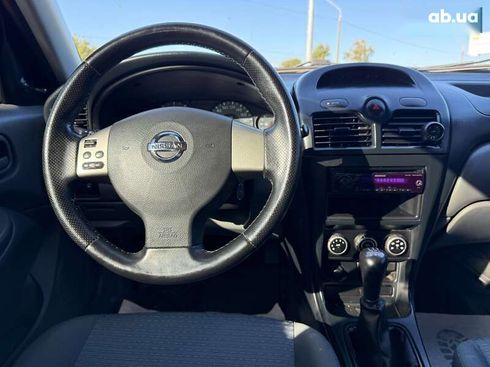Nissan Almera 2012 - фото 14