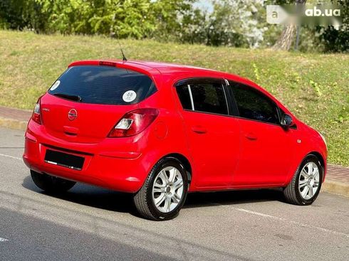 Opel Corsa 2011 - фото 10