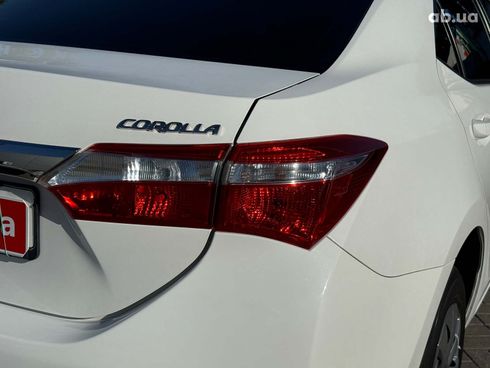 Toyota Corolla 2015 белый - фото 9