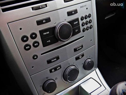 Opel Astra 2009 - фото 10