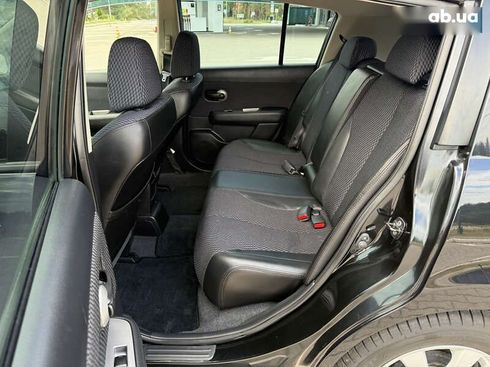 Nissan Tiida 2011 - фото 30