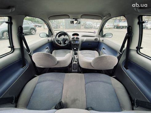 Peugeot 206 2002 серебристый - фото 17