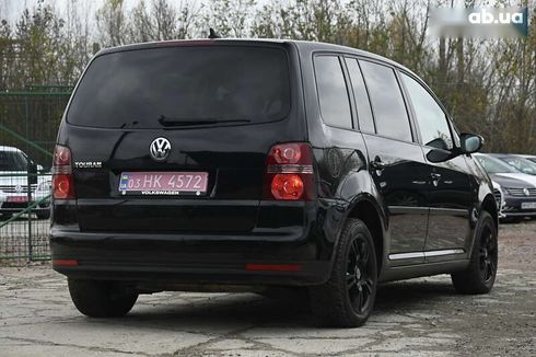 Volkswagen Touran 2009 - фото 11