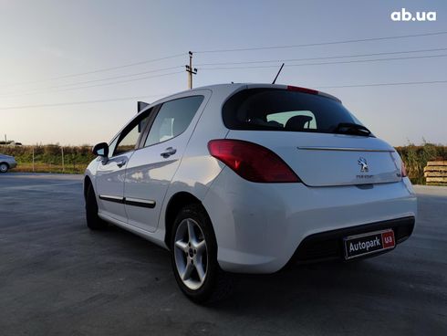 Peugeot 308 2011 белый - фото 10