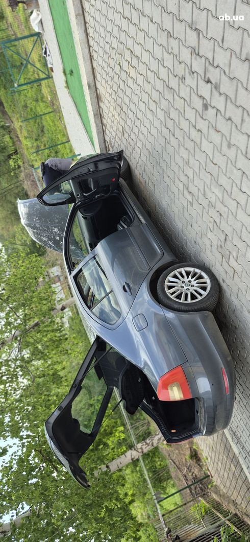 Skoda Octavia 2011 серебристый - фото 4