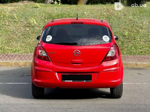 Opel Corsa 2011 - фото 8