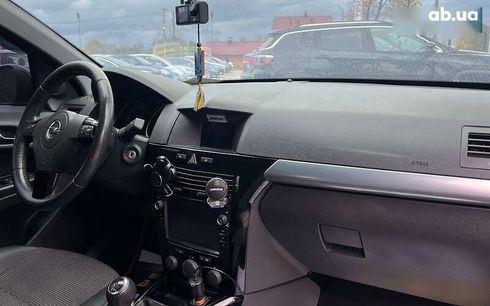 Opel Astra 2010 - фото 17