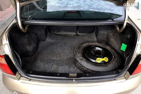Nissan Almera 2004 - фото 22