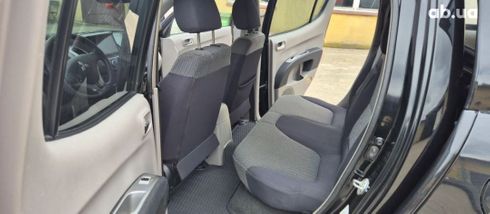 Mitsubishi L200 2007 черный - фото 7