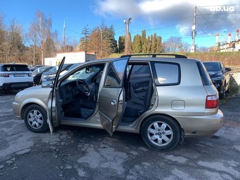 Kia Carens 2003 бежевый - фото 15