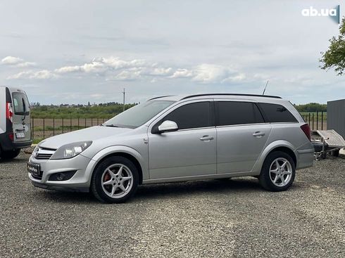 Opel Astra 2010 - фото 5
