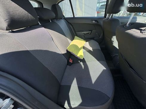 Opel Astra 2012 - фото 27