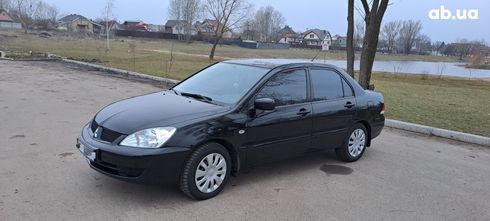 Mitsubishi Lancer 2008 черный - фото 20