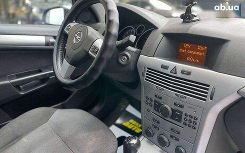 Opel Astra 2009 - фото 12