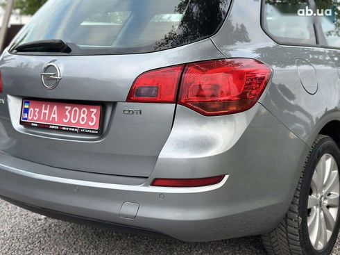 Opel Astra 2010 - фото 24