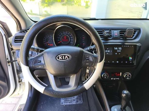 Kia Rio 2012 - фото 14