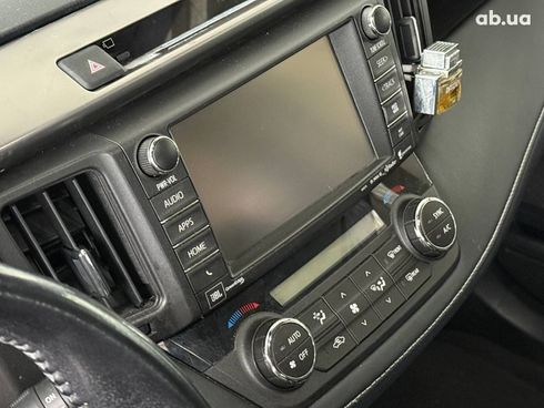 Toyota RAV4 2015 белый - фото 26