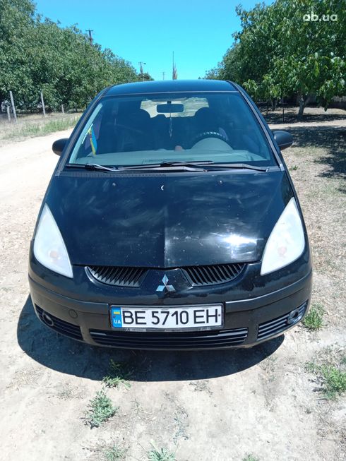 Mitsubishi Colt 2007 черный - фото 10