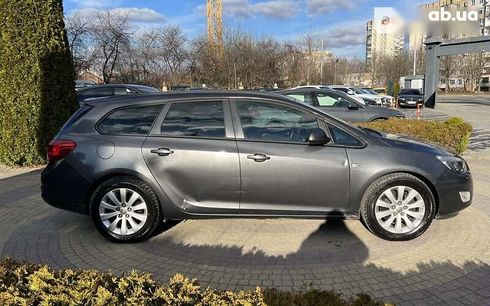 Opel Astra 2010 - фото 8