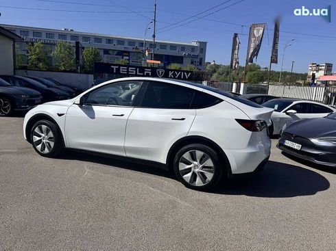 Tesla Model Y 2024 - фото 11