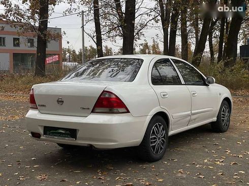 Nissan Almera 2011 - фото 14