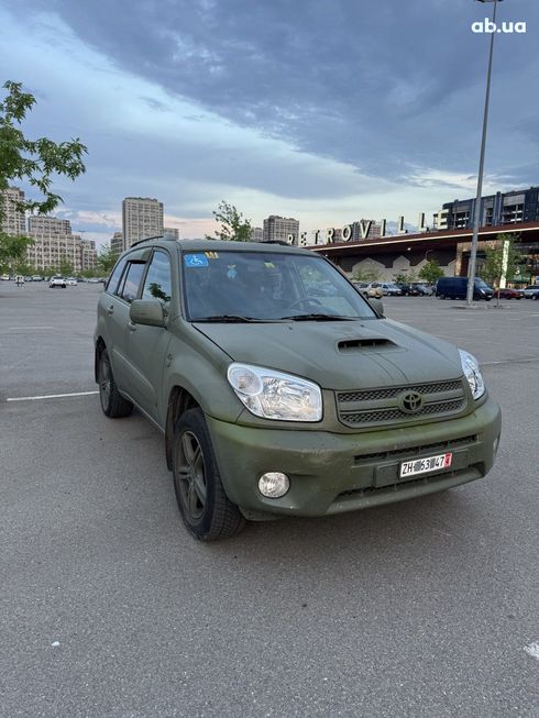 Toyota RAV4 2004 зеленый - фото 7