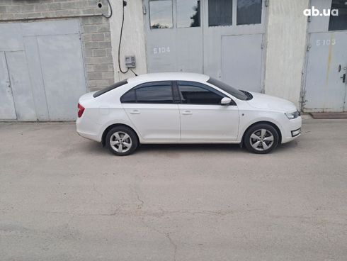Skoda Rapid 2013 - фото 13