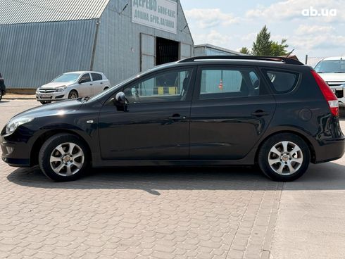 Hyundai i30 2010 черный - фото 8