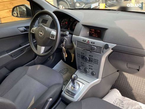 Opel Astra 2012 - фото 14