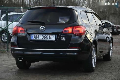 Opel Astra 2014 - фото 11