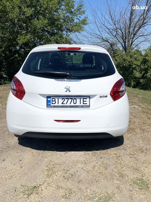 Peugeot 208 2014 белый - фото 18