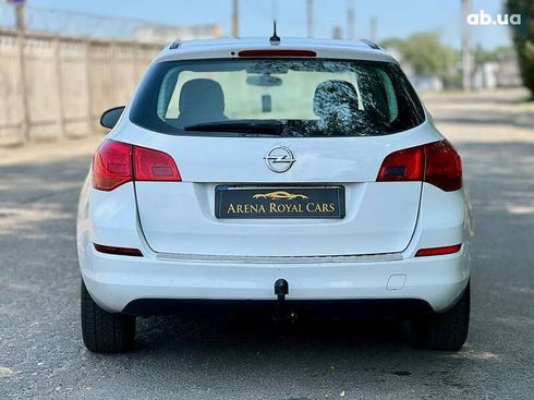 Opel Astra 2011 - фото 7