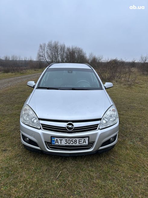 Opel Astra 2008 серебристый - фото 11