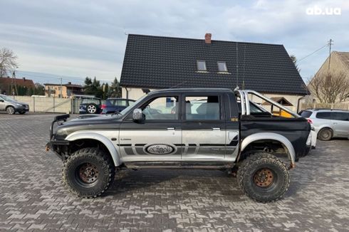 Mitsubishi L200 2005 черный - фото 4