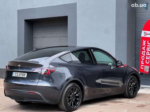Tesla Model Y 2024 - фото 10