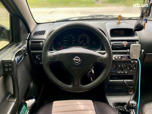 Opel Astra 2008 - фото 29